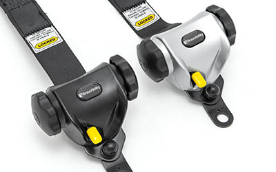 Two Quattro Express retractors, one black and one silver. 