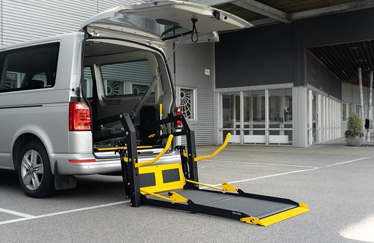 E-Series folding platform wheelchair lift in a Volkswagen Transporter.